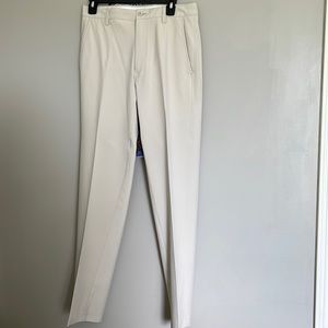 Footjoy mens pants with flat front and rear and side pockets in light stone.